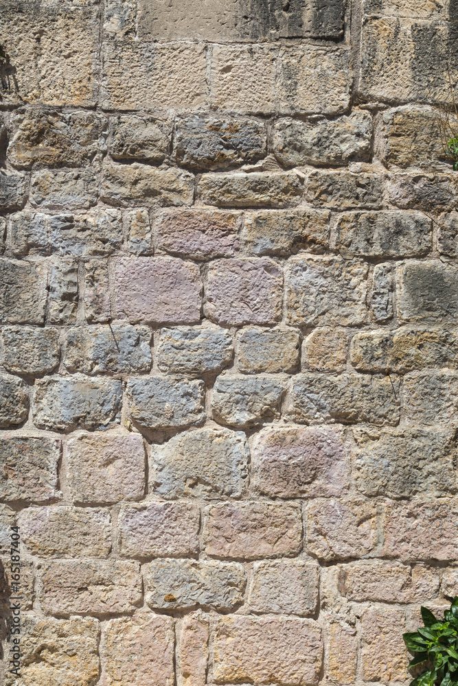 Fototapeta premium Pattern of the ancient style stone wall with cement.