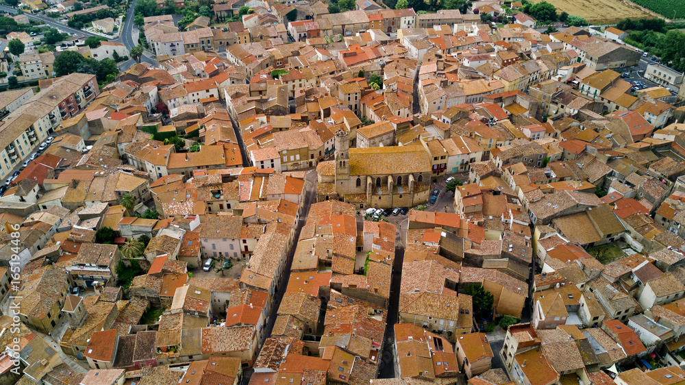 Aerial top view of residential area roofs from above, medieval town background
