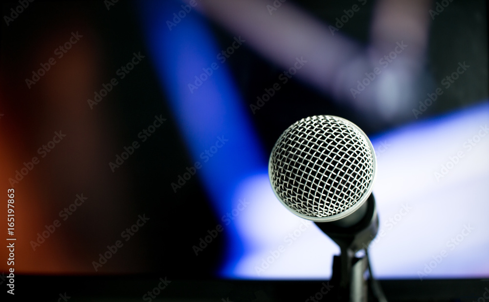 Microphone on abstract blurred of speech in seminar room or speaking conference hall light, Event concert bokeh background Microphone on abstract blurred of speech in seminar room or speaking conference hall light, Event concert bokeh background