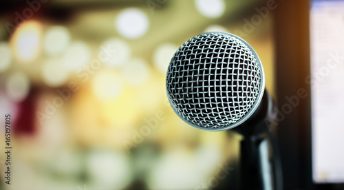 Microphone on abstract blurred of speech in seminar