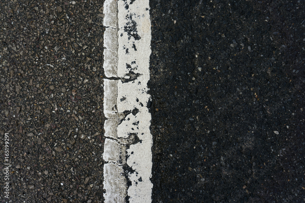 Fototapeta premium yellow line on road texture,old