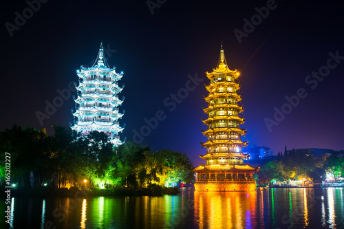 Guilin towers in illuminated city park in Guangxi  China