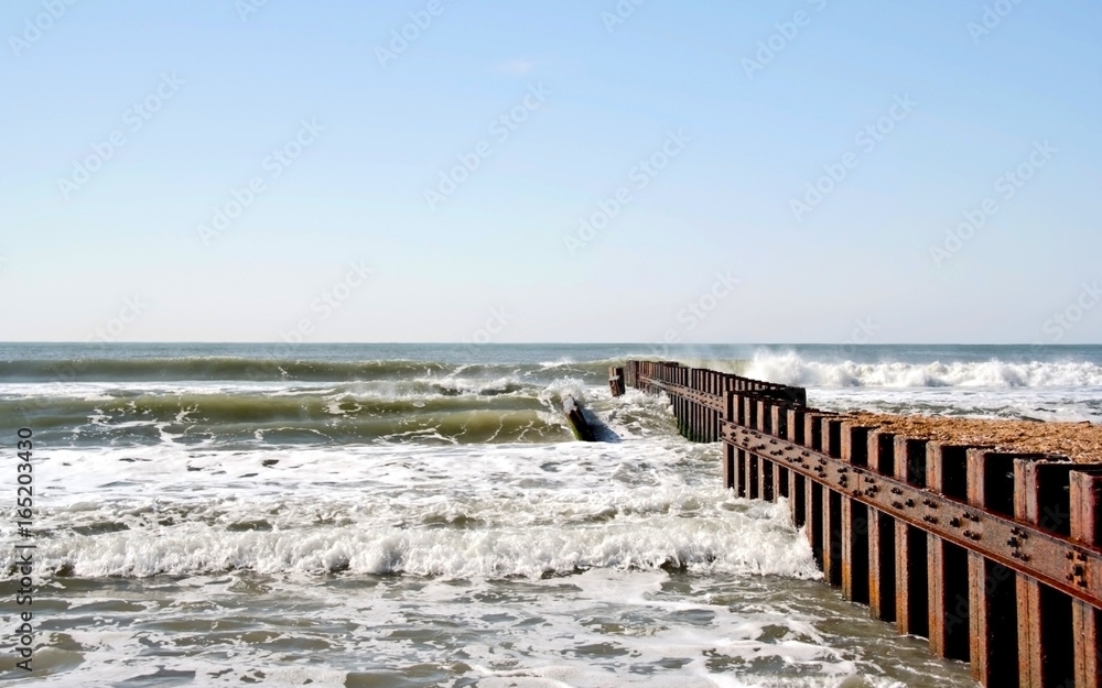 Deteriorating metal breakwater. Atlantic Ocean. North Carolina.