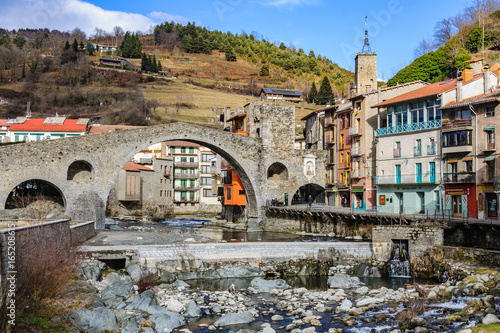Stone bridge and river in Camprodon, Spain photo