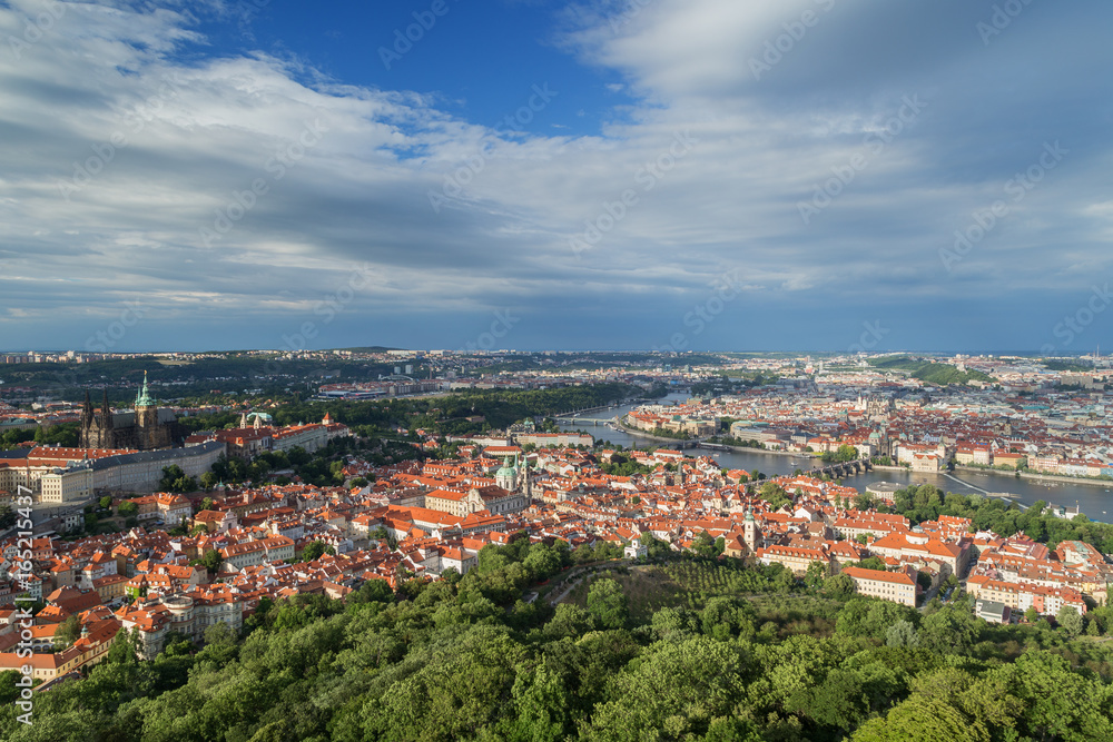 View of the Petrin Hill, Mala Strana (Lesser Town) and Old Town districts and beyond in Prague, Czech Republic, from above. Copy space.