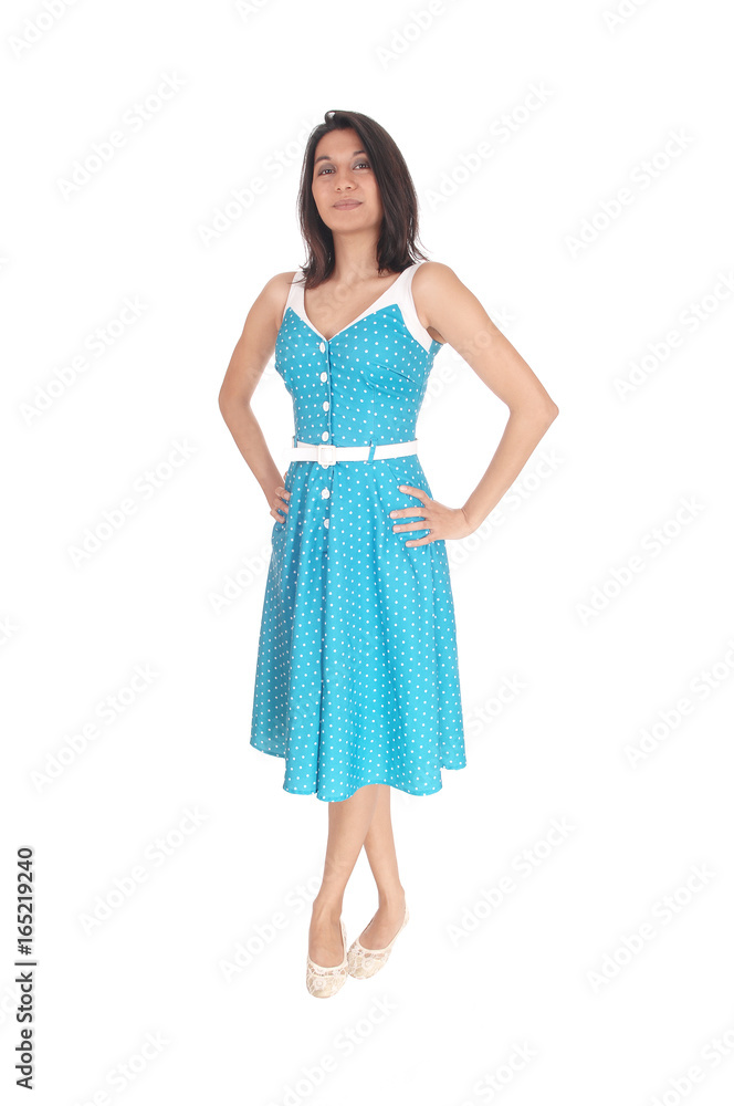 Beautiful Hispanic woman standing in blue dress. Beautiful Hispanic woman standing in blue dress.