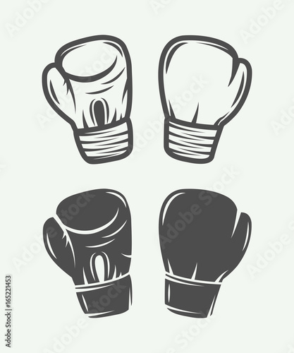 Set of vintage boxing gloves in retro style. Vector illustration. Monochrome Graphic Art.