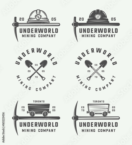 Set of retro mining or construction logos, badges, emblems and labels in vintage style. Monochrome Graphic Art. Vector Illustration.