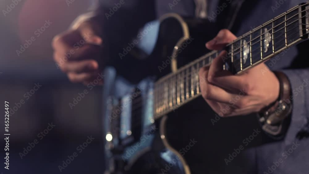 Musician playing guitar