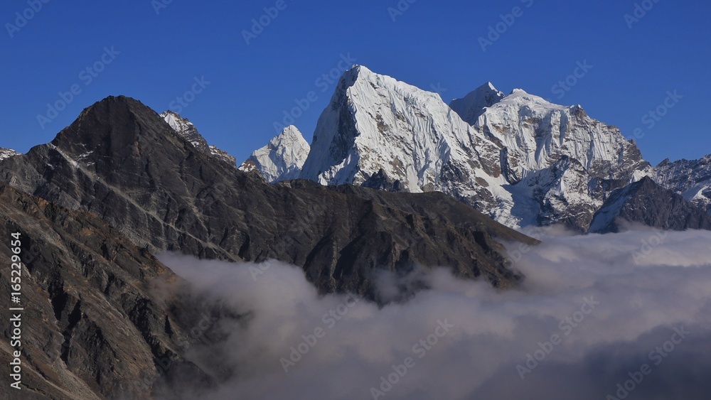 Peaks of Ama Dablam, Cholatse and Taboche. Peaks of Ama Dablam, Cholatse and Taboche.