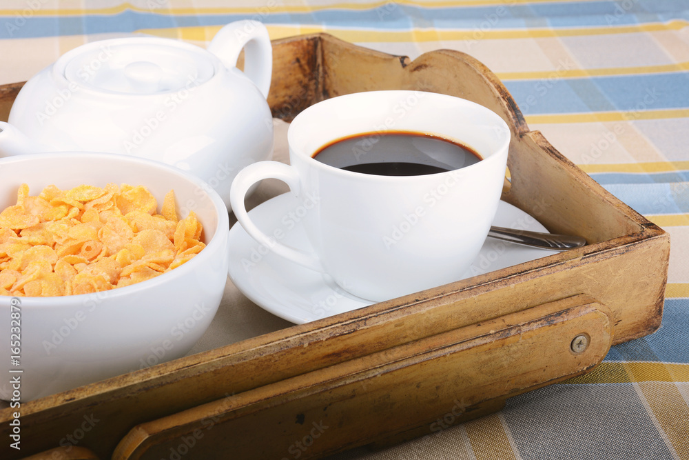Breakfast tray with coffee and cereals. Breakfast tray with coffee and cereals.