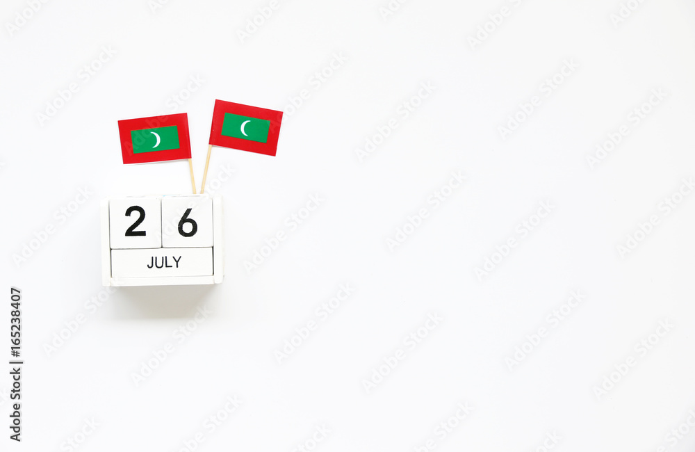 July 26 Wooden calendar Concept independence day of Maldives and Maldives national day.Copy space,minimal style July 26 Wooden calendar Concept independence day of Maldives and Maldives national day.Copy space,minimal style