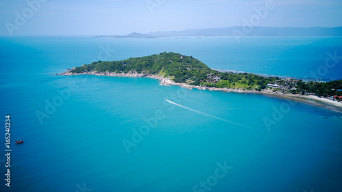 Aerial view from the drone on the taxi boats at the azure sand beach of Thailand,koh Phangan island,Haad Rin beach