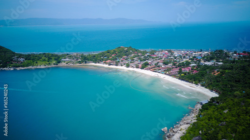 Aerial view from the drone on the taxi boats at the azure sand beach of Thailand,koh Phangan island,Haad Rin beach © Glebstock