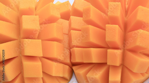Mango slice cut to cubes close-up