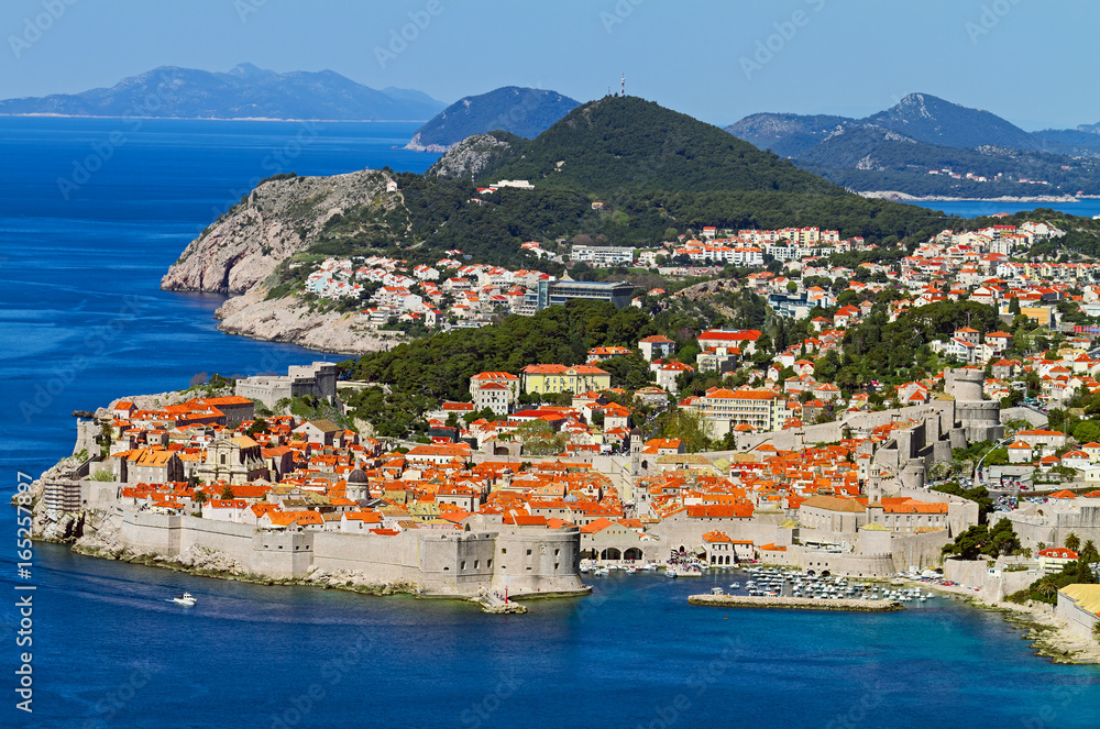 View of the Dalmatian coastline with the old town Dubrovnik on foreground, Croatia.	

