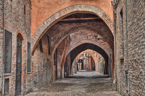 Ferrara, Italy: the medieval alley Via delle Volte photo