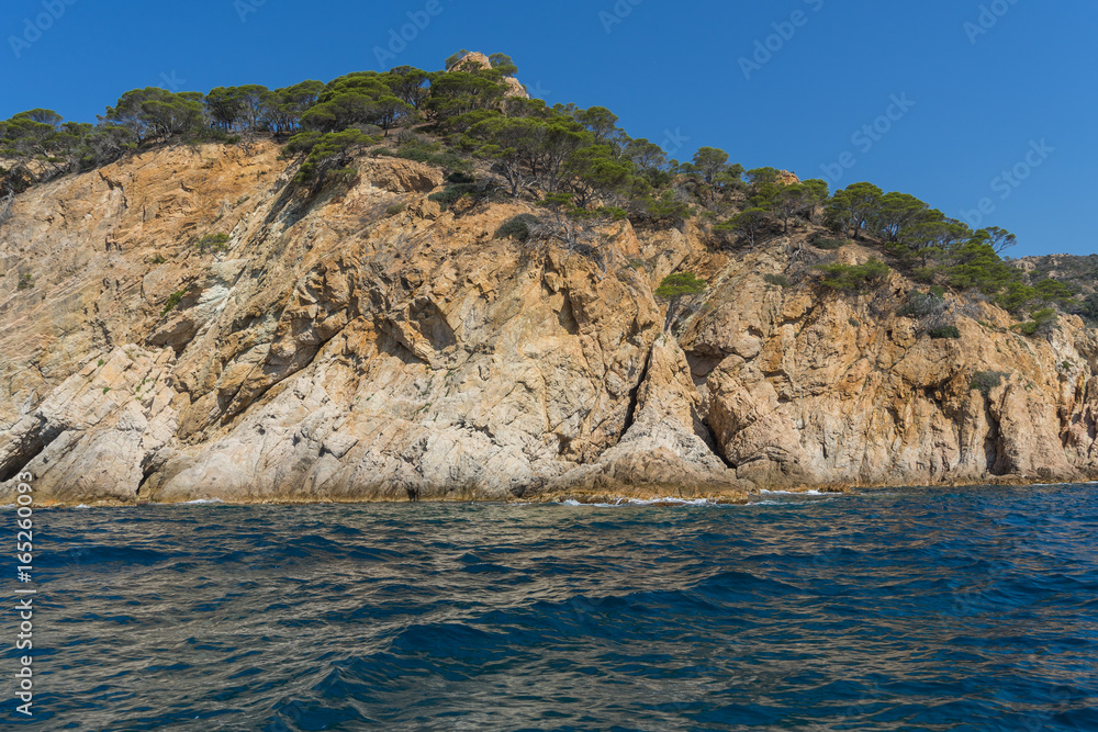 View from the sea on a beautiful rocky landscape on a sunny day