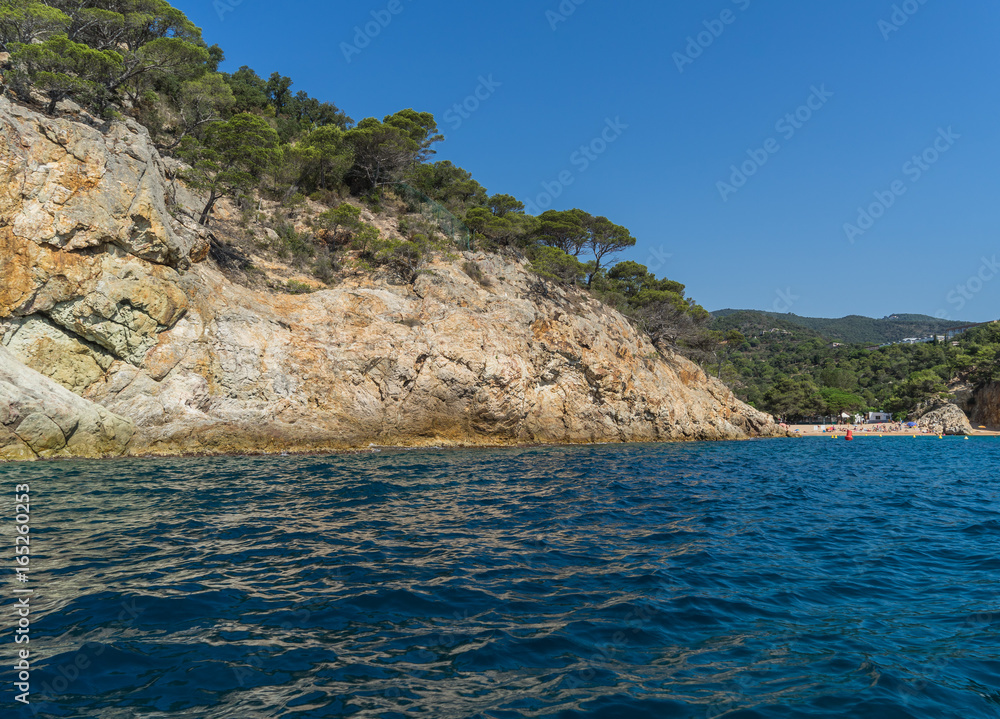 View from the sea on a beautiful rocky landscape on a sunny day