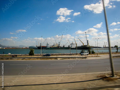 Street and quay in Tunisia in clear weather July 2013