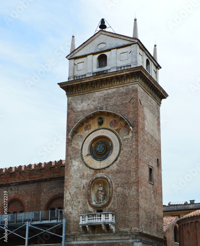 Clock tower in Piazza delle Erbe square in Mantua, Italy photo