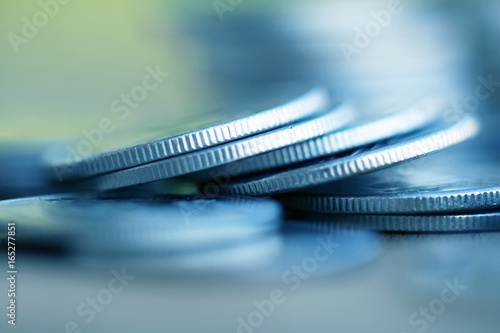 Row of coins on wood background for finance and Saving concept Investment  Economy  Soft focus and dark style.