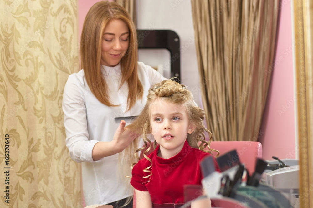 Little girl at the hairdresser. Cute caucasian child. Little girl at the hairdresser. Cute caucasian child.