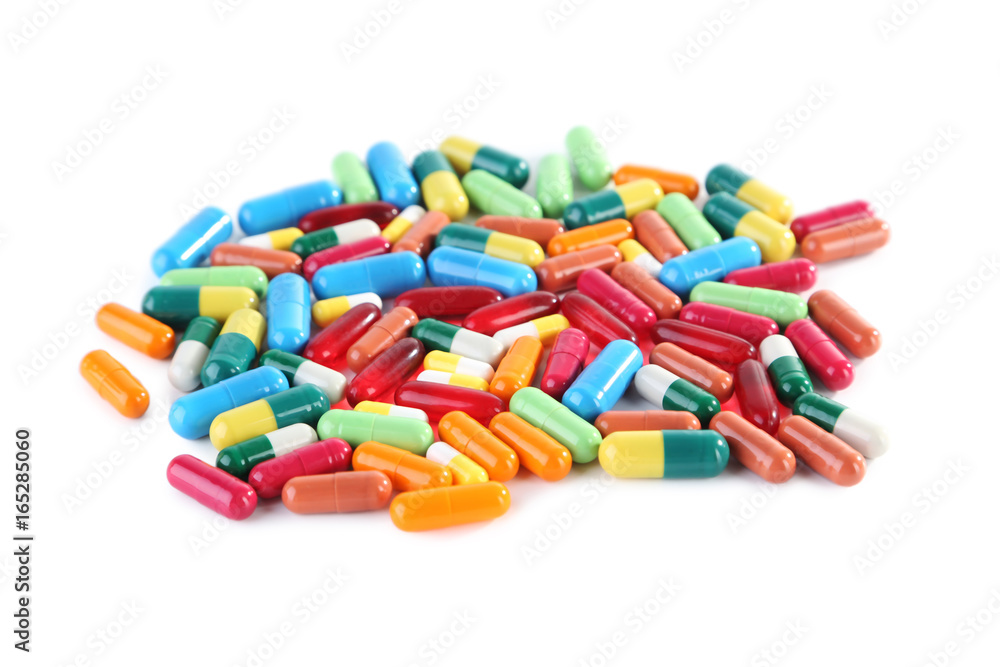 Colorful capsules pills isolated on white background Colorful capsules pills isolated on white background