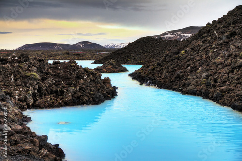 Canvas Print Blue lagoon waters in the lava field landscape of Iceland in winter