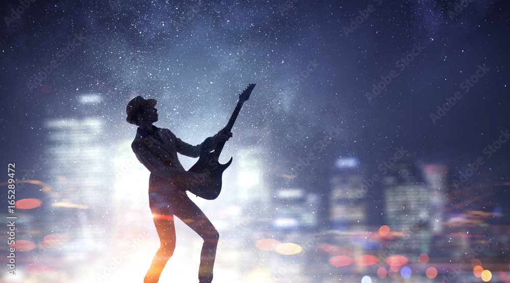 Fototapeta premium Rock girl with guitar. Mixed media