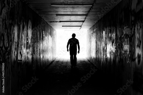 Man in a tunnel in black and white