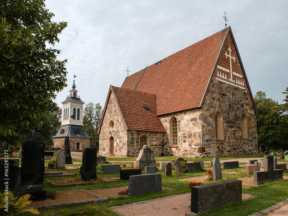 Old calm quiet church graveyard - Church in Scandinavian style