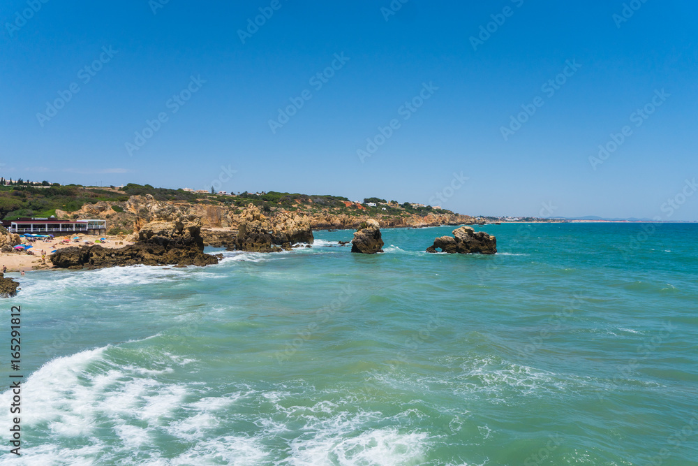 A view of a marvelous sandy beach portugal. Summer time