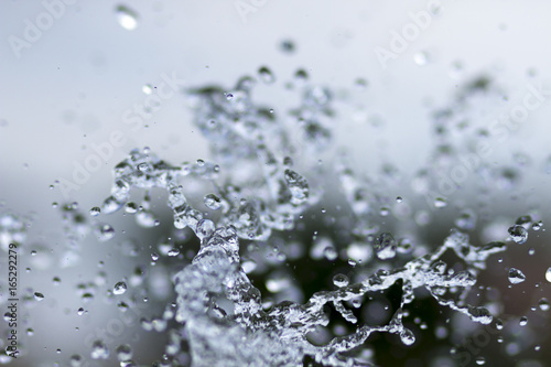 water splash and blue sky as a background