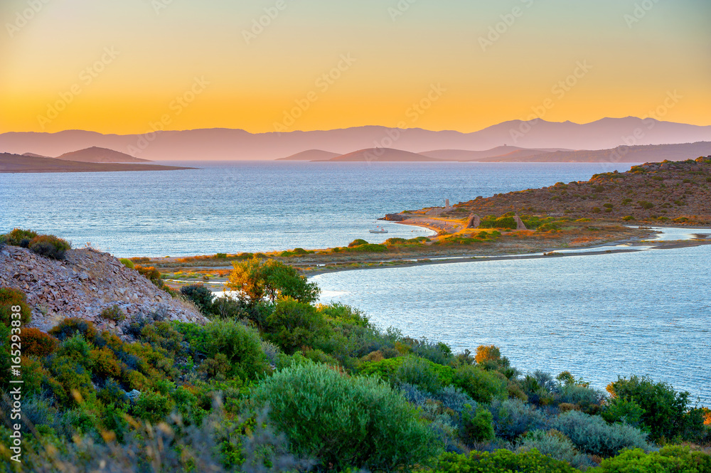 view of the gulf and the island of the Aegean Sea during a sunset