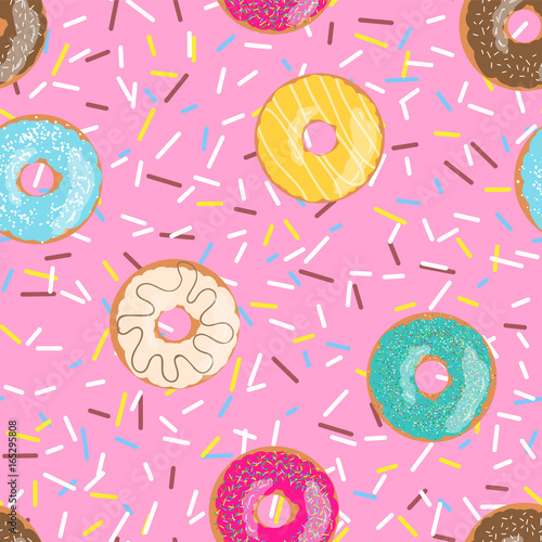 Seamless pattern bright pink tasty vector donuts and sprinkles background in cartoon style for menu in cafe and shop.