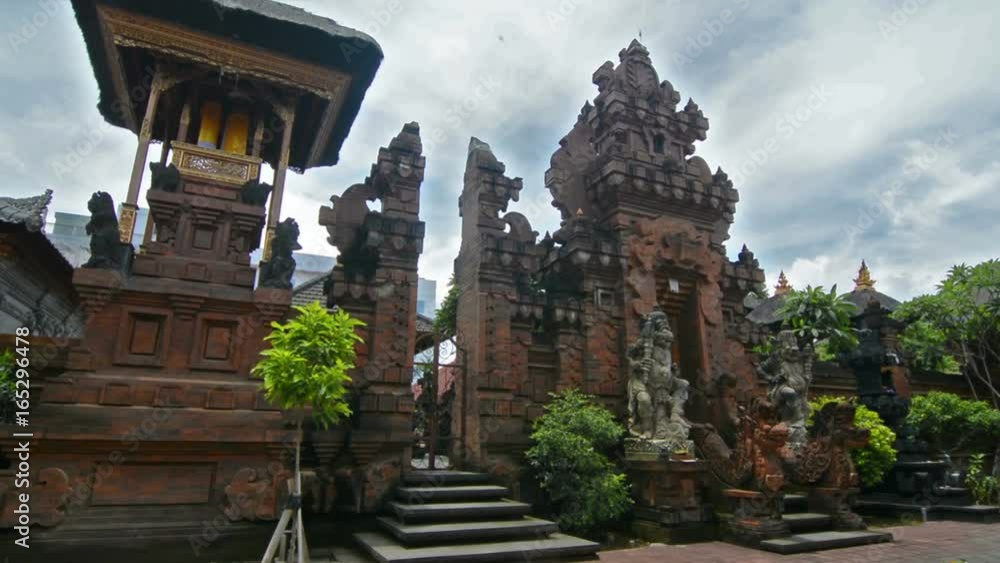 Statues at the entrance of a hinduist temple in Bali, Indonesia. Zoom in. Statues at the entrance of a hinduist temple in Bali, Indonesia. Zoom in.