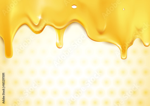 Sweet gold dripping honey on honeycomb background
