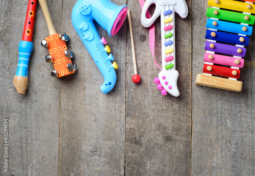 toy Musical instruments on wooden background