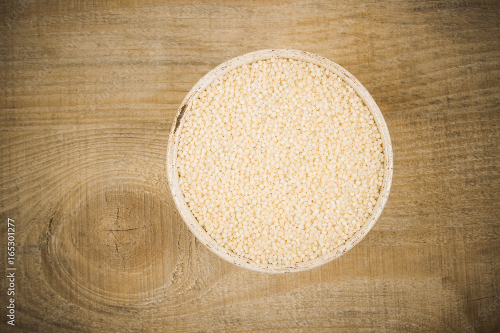 Dry millet groats. Healthy food and diet concept.