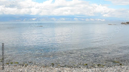 Clear fresh water in the lake Baikal, Russia photo