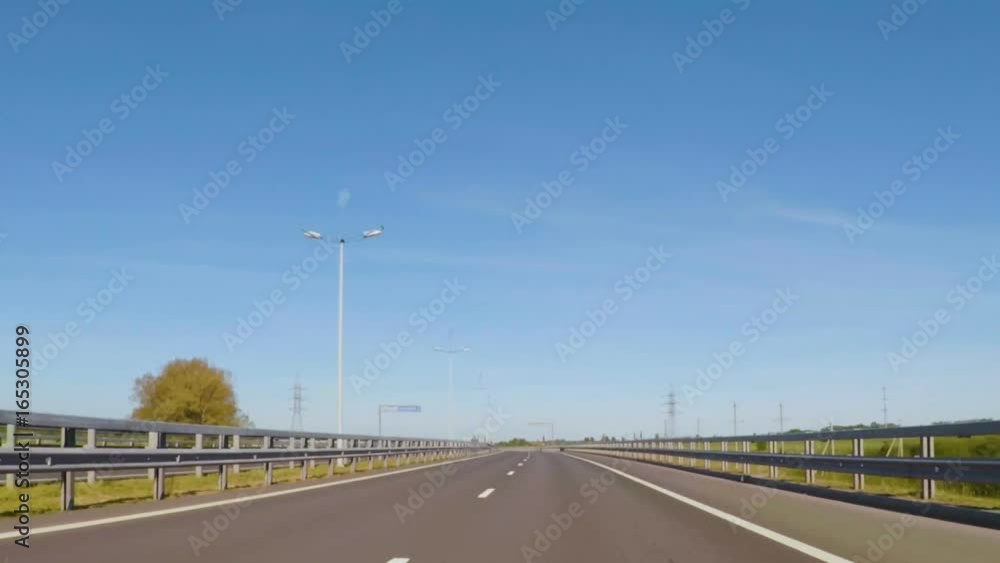 Travel around Europe by car. Hyperlapse. Motion time lapse, of a road from the driver's perspective. Driving a car on a country road POV. Shot at daylight in a road crossing small cities. Time Lapse. Travel around Europe by car. Hyperlapse. Motion time lapse, of a road from the driver's perspective. Driving a car on a country road POV. Shot at daylight in a road crossing small cities. Time Lapse.