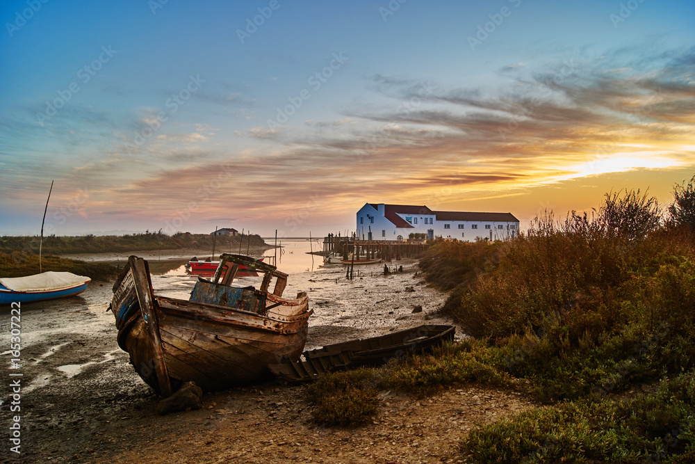 abandoned boat by the sea shore