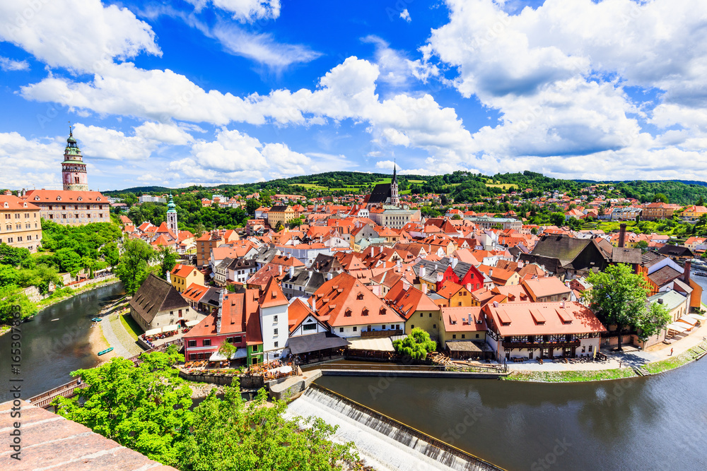 Cesky Krumlov, Czech Republic. The State Castle, St. Vitus Church and cityscape. UNESCO World Heritage Site.