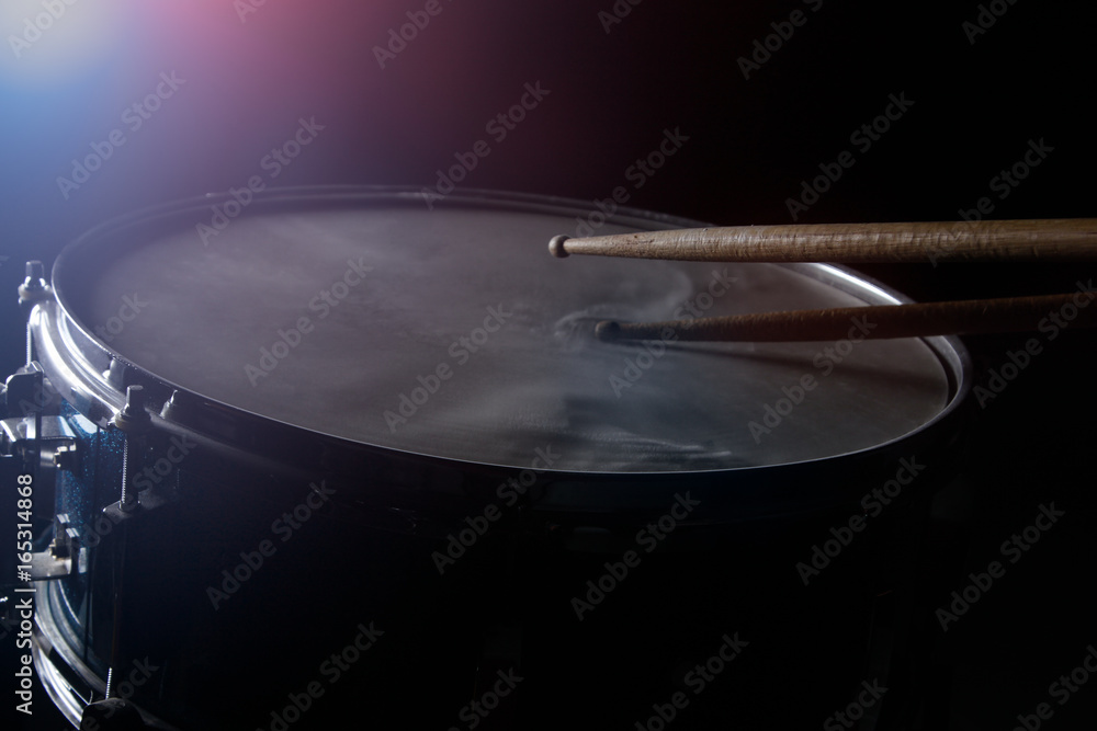 The drum sticks and snare drum The drum sticks and snare drum