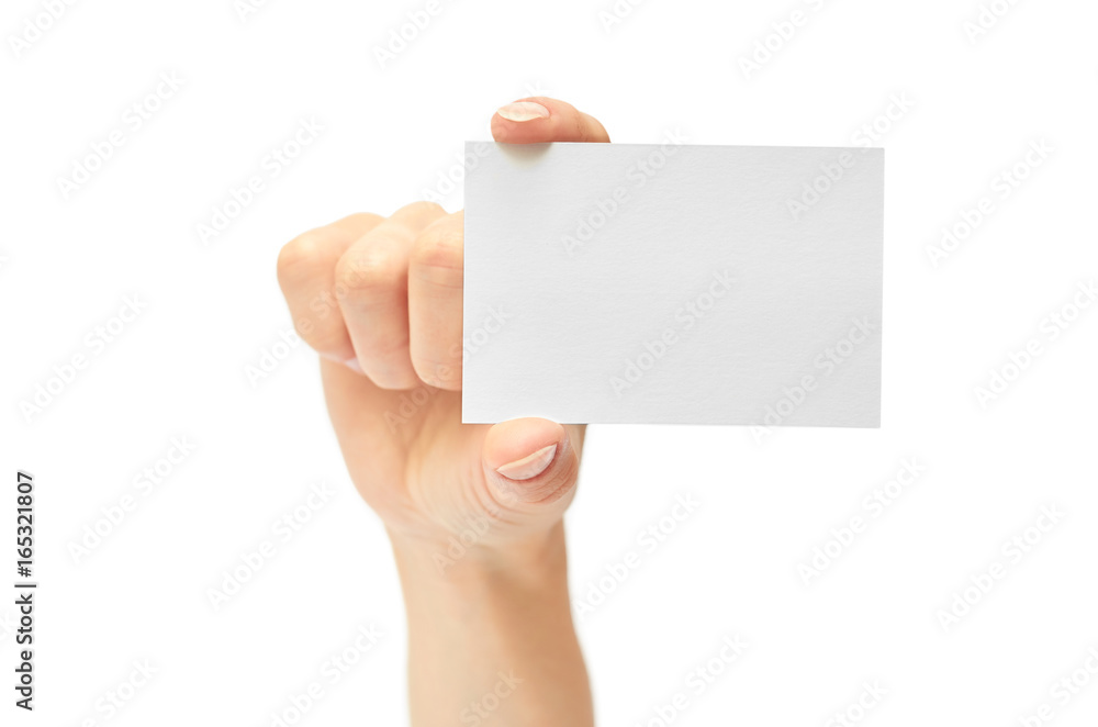 Female hands hold a business card. Isolated on white background Female hands hold a business card. Isolated on white background