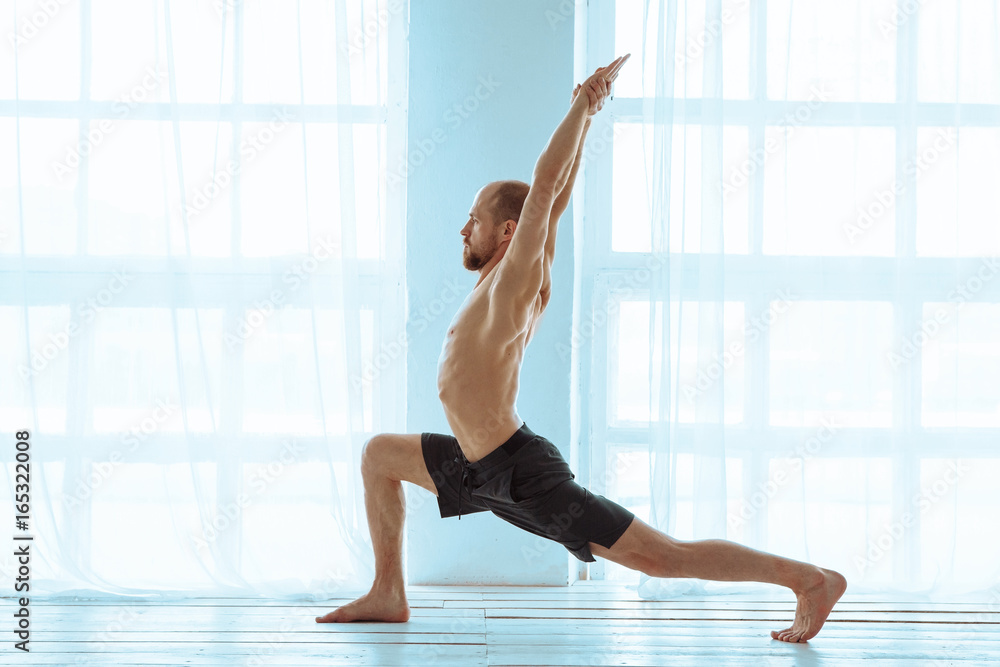 Man practicing advanced yoga. A series of yoga poses. Lifestyle concept