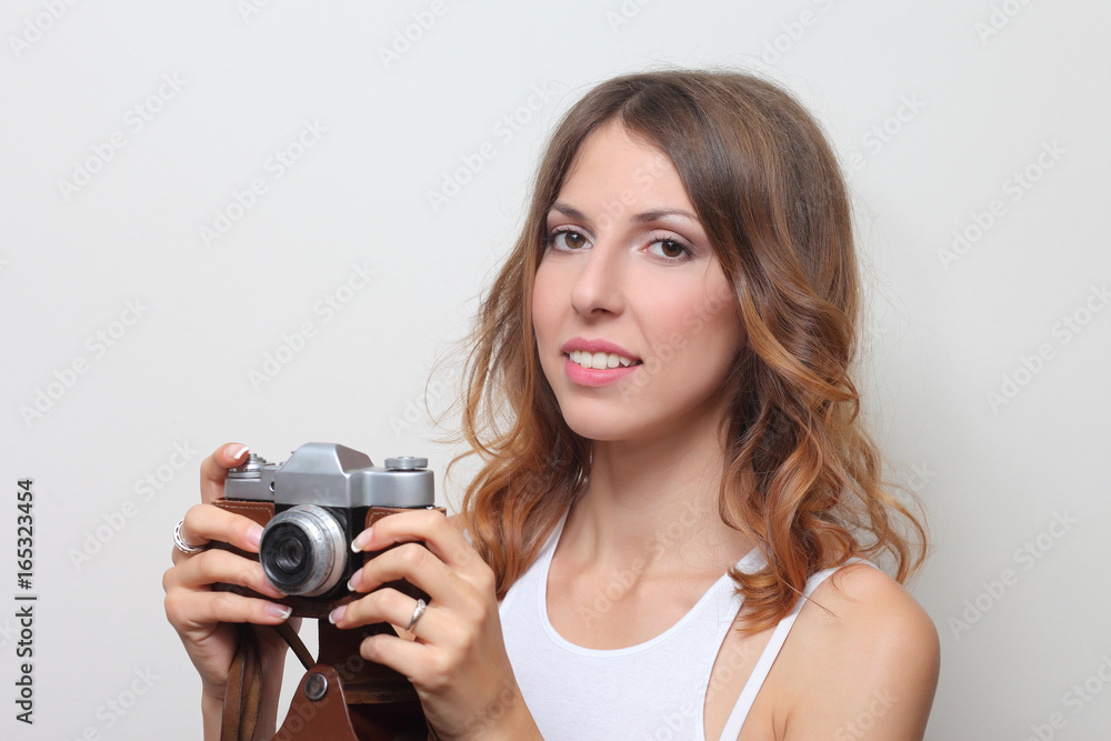 photographer holding a film camera in hands photographer holding a film camera in hands