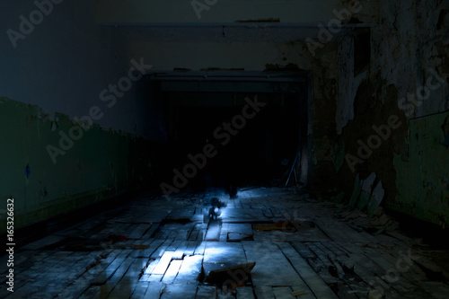 Scary dark basement inside abandoned structure of the left Potsdam miliary base