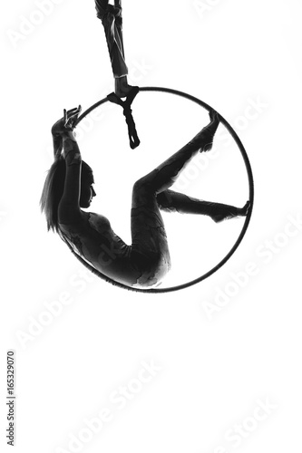 girl on the air ring gymnastics silhouette isolated on the white background